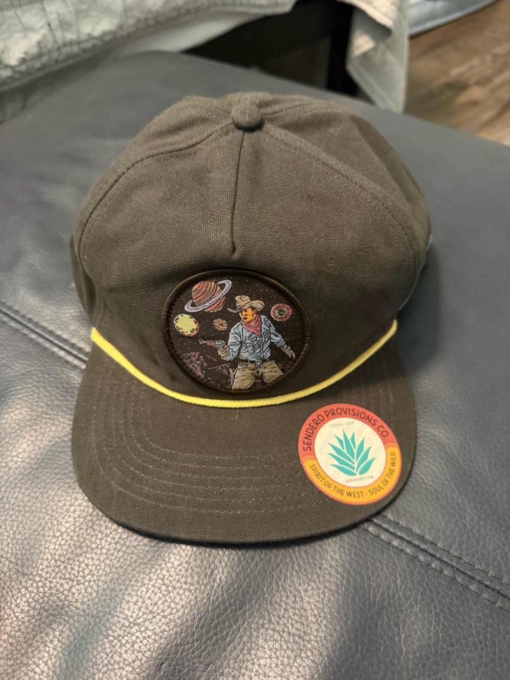 Sendero Provisions Co. Space Cowboy Patch Hat in Olive with Yellow Trim